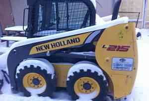  мини погрузчик New Holland L215