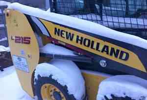  мини погрузчик New Holland L215