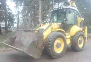 Экскаватор погрузчик NEW holland