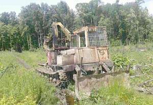 Валочно- пакетирующий трактор