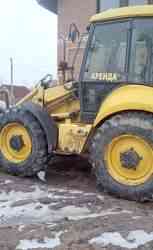  экскаватор-погрузчик "New Holland LB-115"